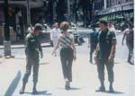 Gail Howard in Viet Nam 1967. G.I.'s glancing back at Gail Howard walking down Tudo Street in Saigon.